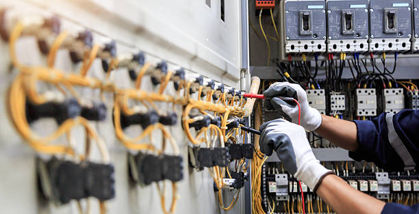 Professional Electrician technician working in Maysville, OK